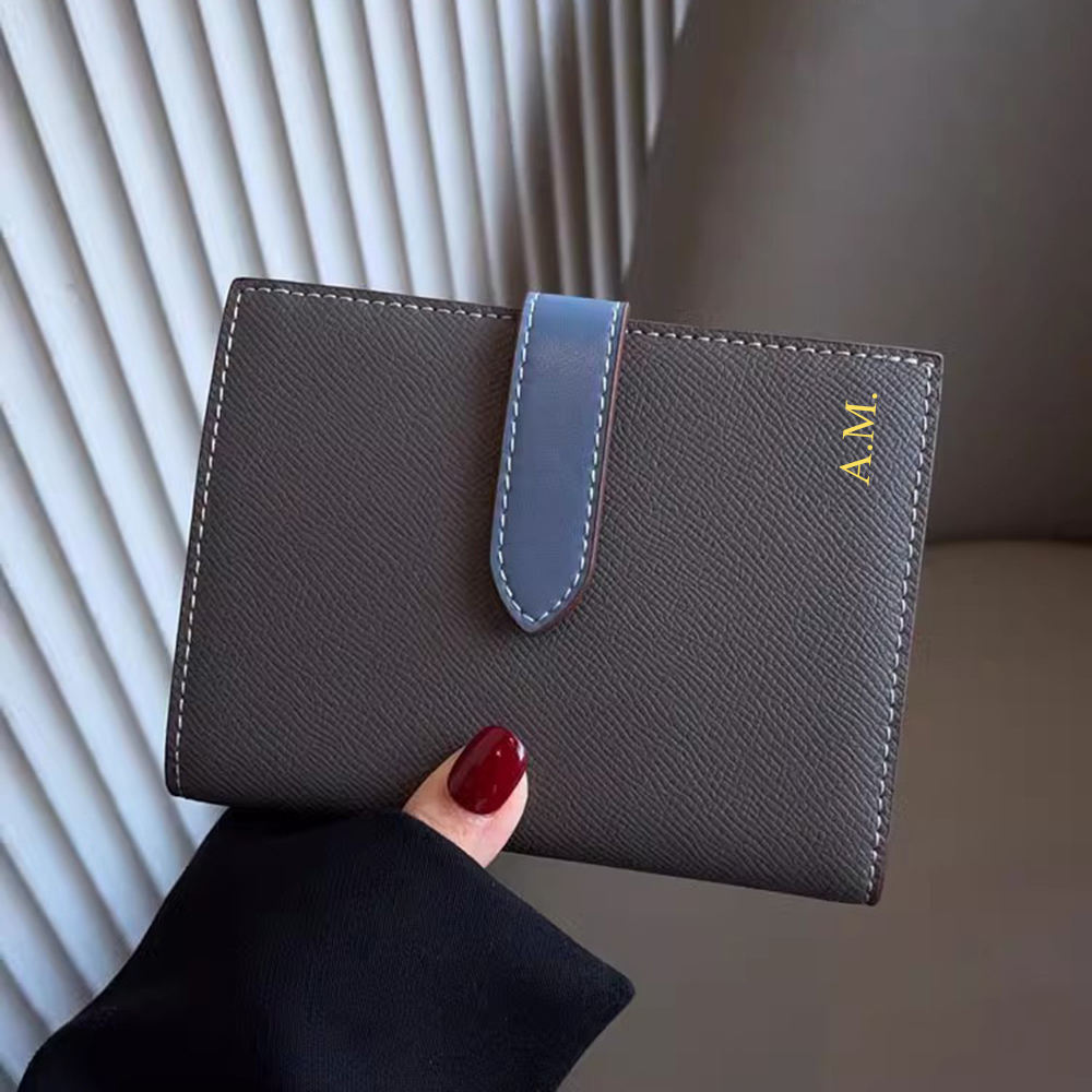 محفظة جواز سفر جلدية فاخرة من  - مراجعة Card Top Loader وسعره